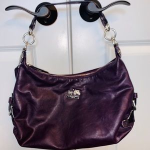 Purple leather Coach purse.